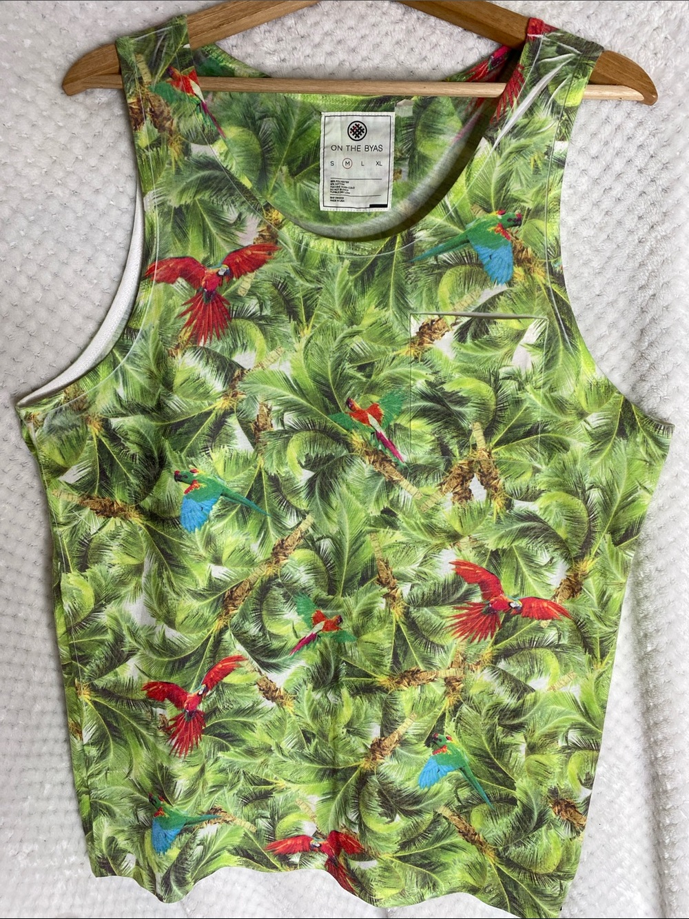 on the byas Tropical Parrot Print Green Tank Top with Red & Blue Accents